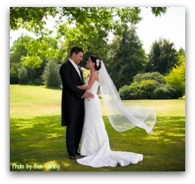 bride-and-groom-posing-outdoors